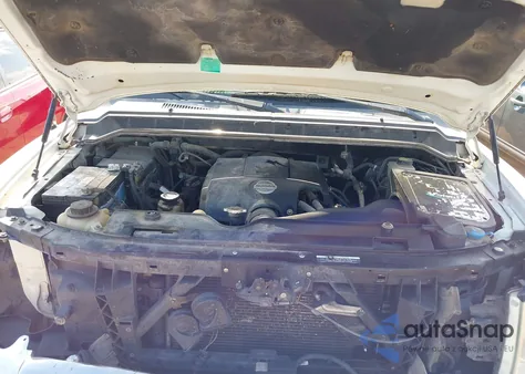 2013 Nissan Titan Sl z USA, uszkodzony, nr VIN 1N6BA0EDXDN310437